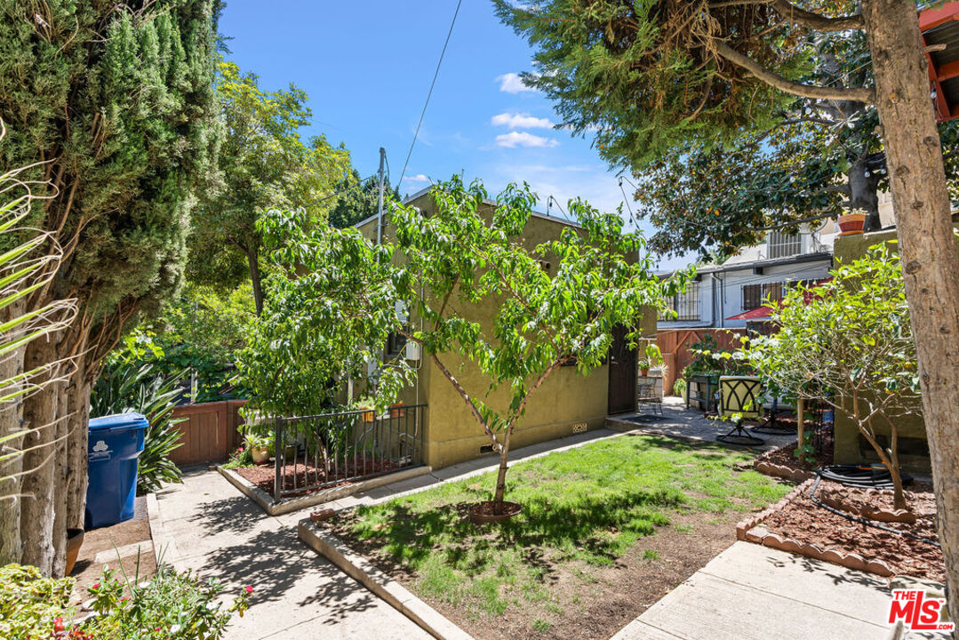2403 Hyperion Avenue Los Angeles, CA 90027 - Photo 33 of 53 a view of a chairs and bench in a garden
