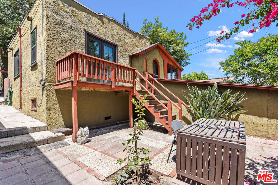 2403 Hyperion Avenue Los Angeles, CA 90027 - Photo 35 of 53 a roof deck with table and chairs