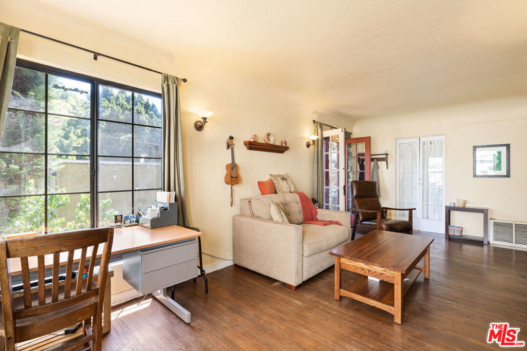2403 Hyperion Avenue Los Angeles, CA 90027 - Photo 8 of 53 a living room with furniture and a window