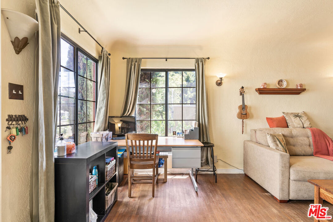 2403 Hyperion Avenue Los Angeles, CA 90027 - Photo 9 of 53 a living room with furniture and a window