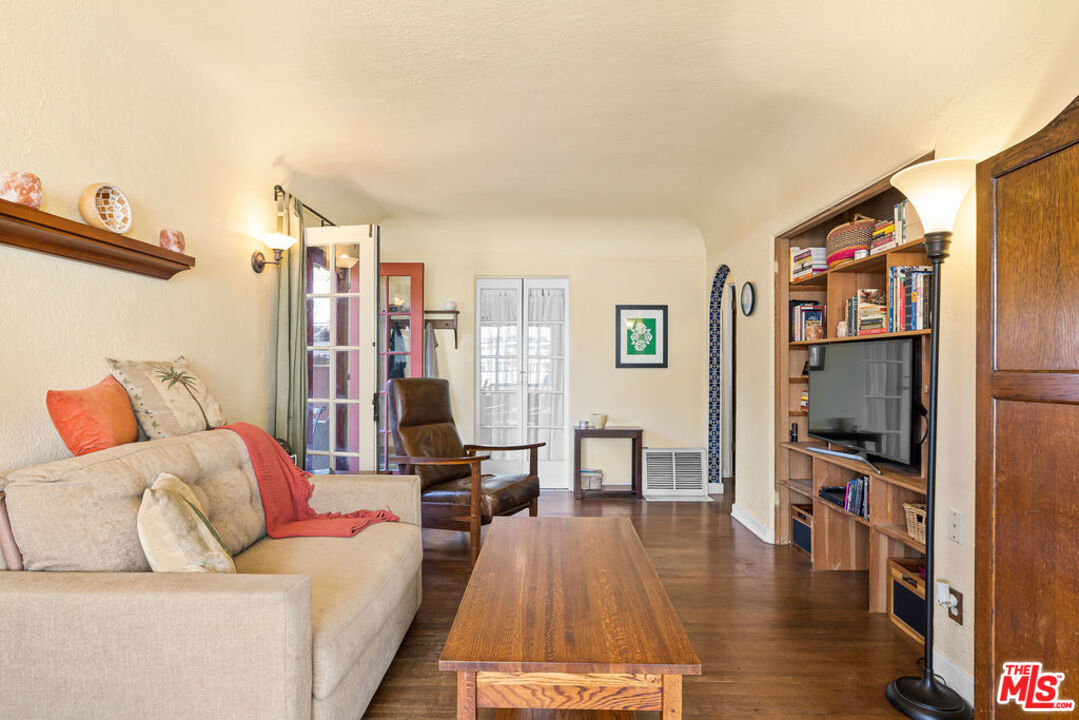 2403 Hyperion Avenue Los Angeles, CA 90027 - Photo 10 of 53 a living room with furniture and a flat screen tv