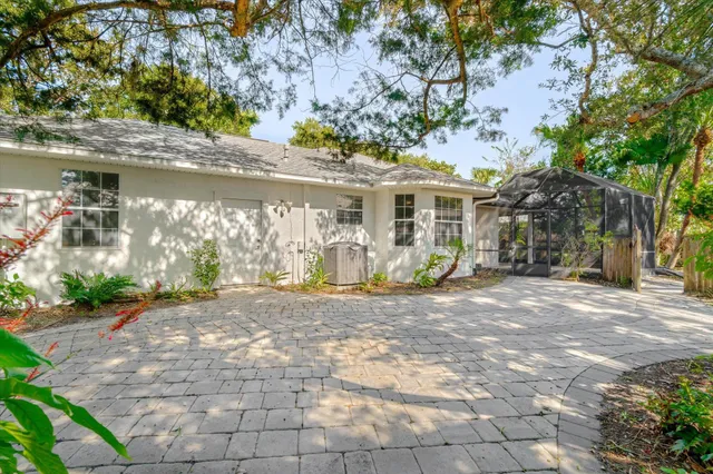 a view of a backyard with tree s