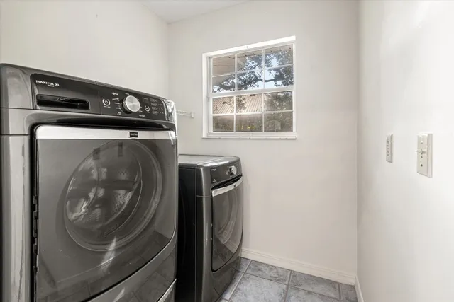 a view of a house with a tree