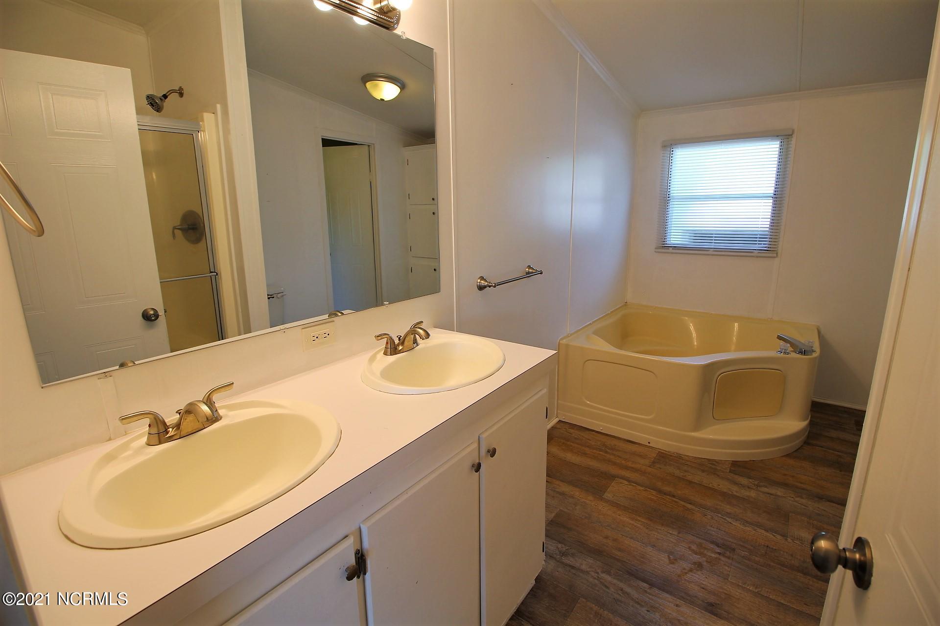 1085 Temples Point Road Havelock, NC 28532 - Photo 24 of 41 Private master bath with dual sinks