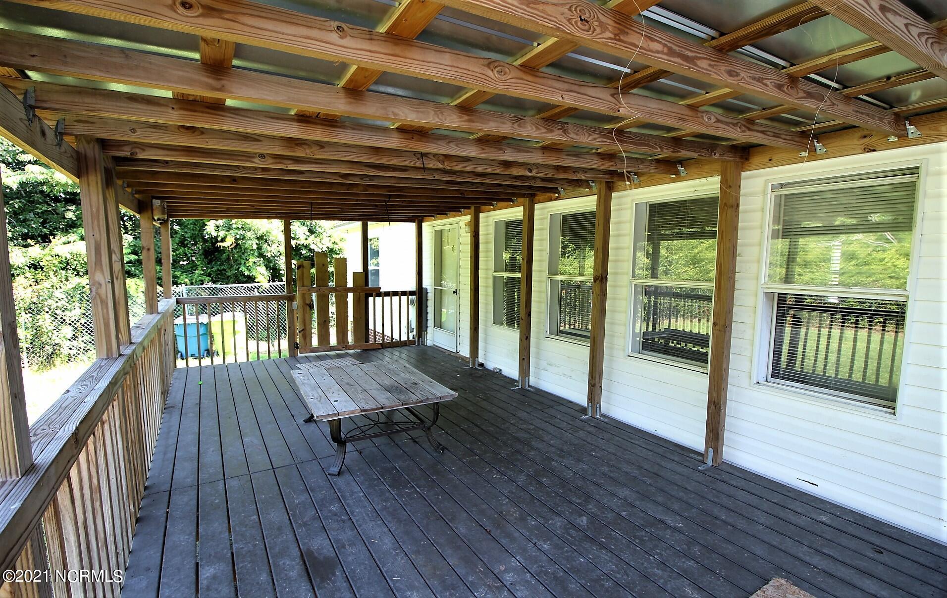 1085 Temples Point Road Havelock, NC 28532 - Photo 39 of 41 Covered rear deck (23ft by 11.6ft)
