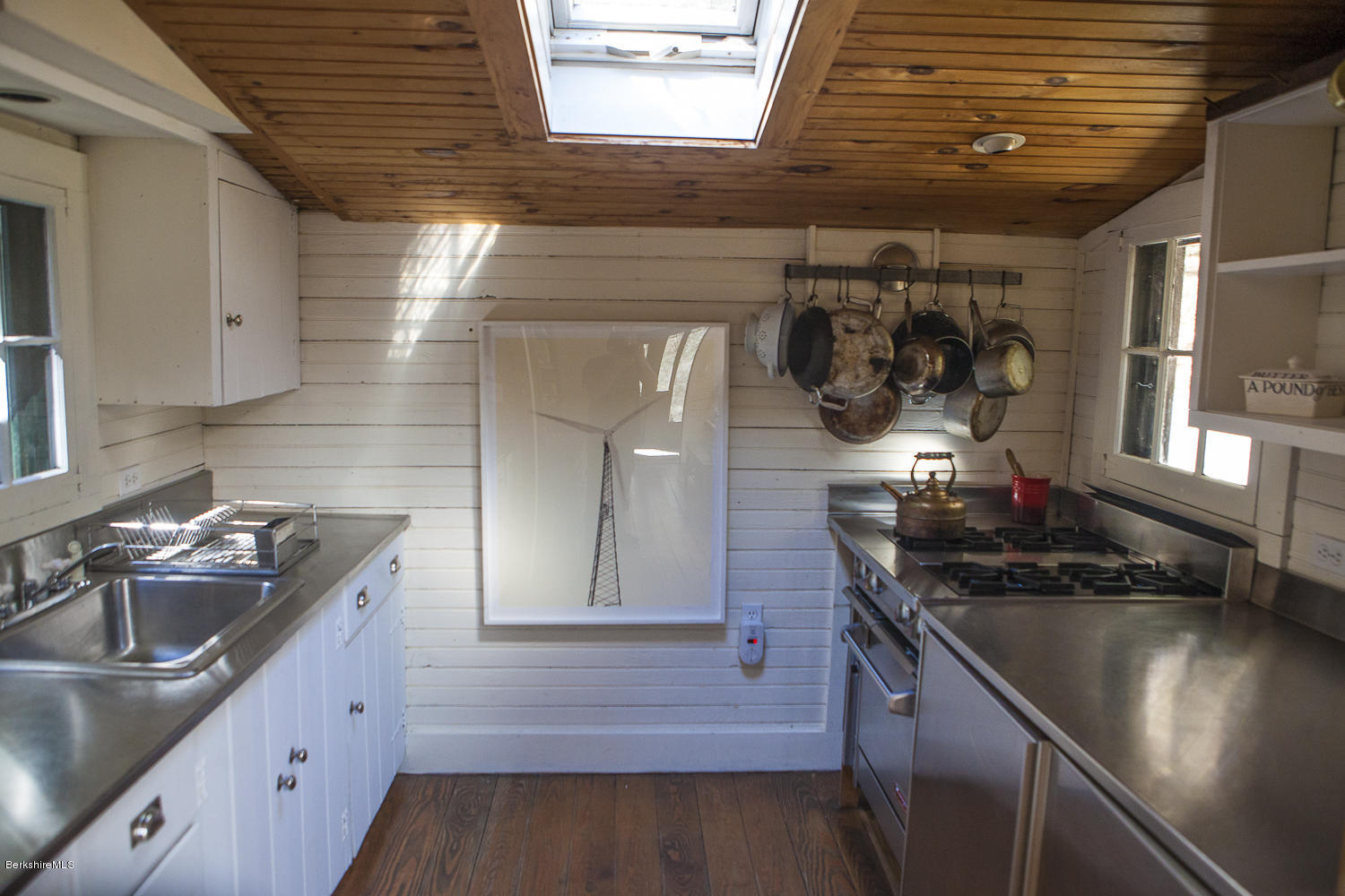 46 Fairview Road Monterey, MA 01245 - Photo 8 of 20 a kitchen with a sink and cabinets