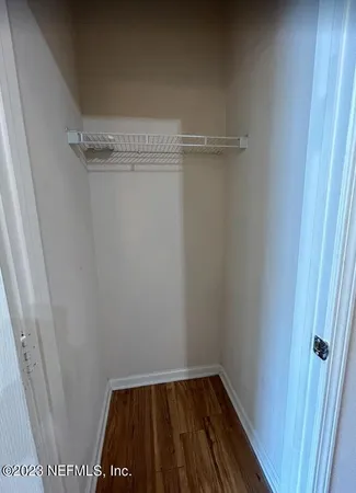 a view of small space with racks on the wall