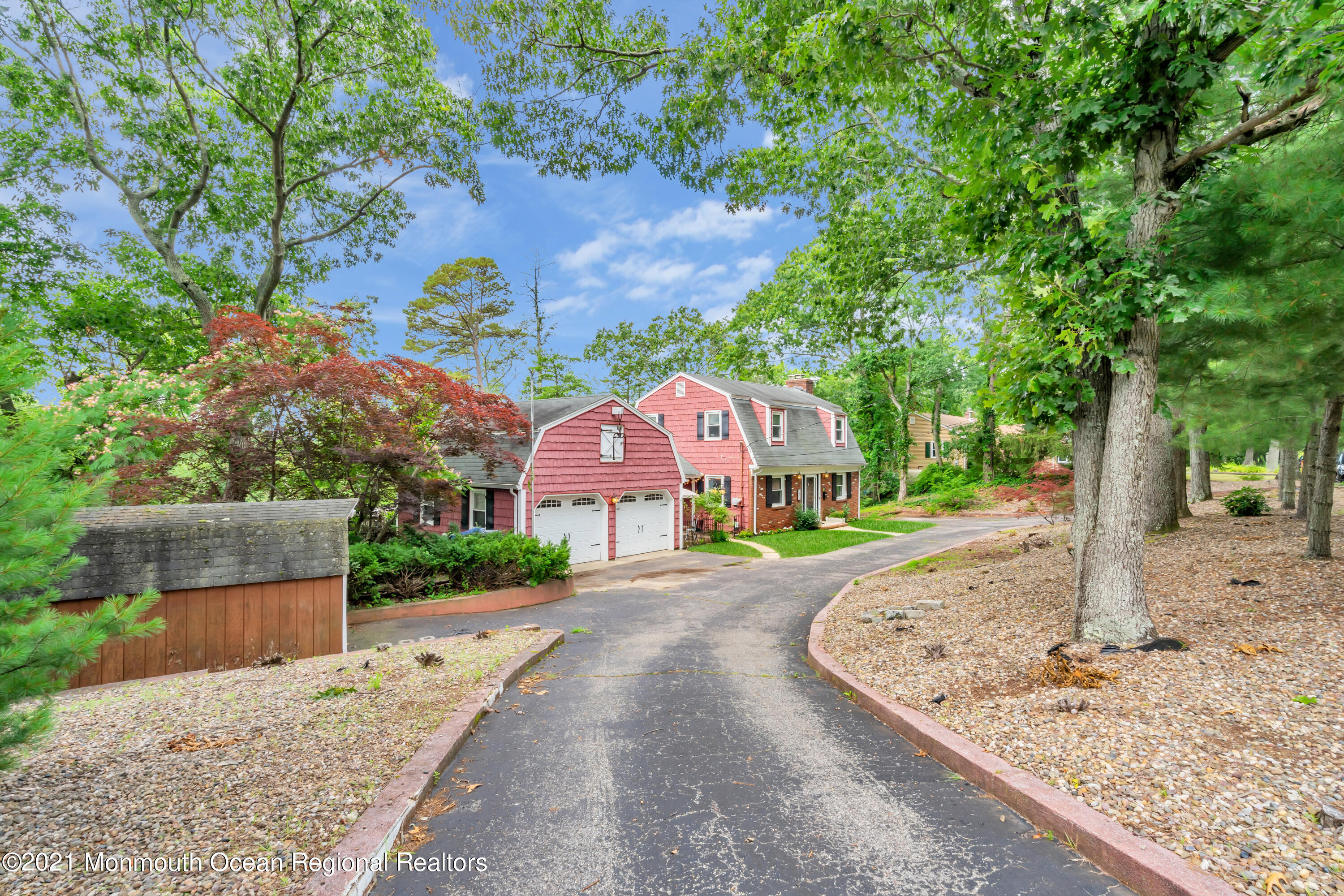 1675 Forge Pond Road Brick, NJ 08724 - Photo 2 of 69 a front view of a house with a yard and large tree