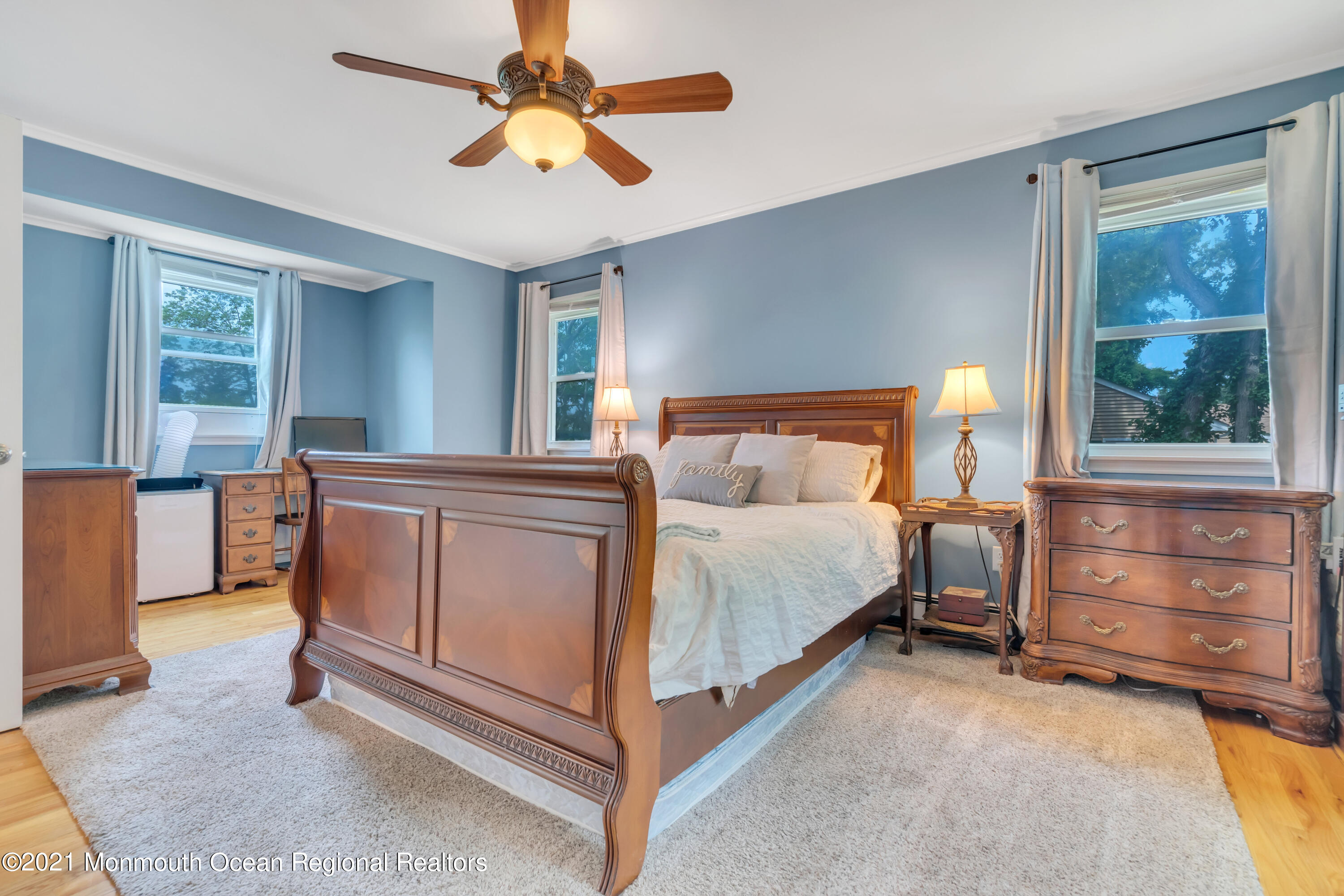 1675 Forge Pond Road Brick, NJ 08724 - Photo 27 of 69 a bedroom with a bed and a chandelier