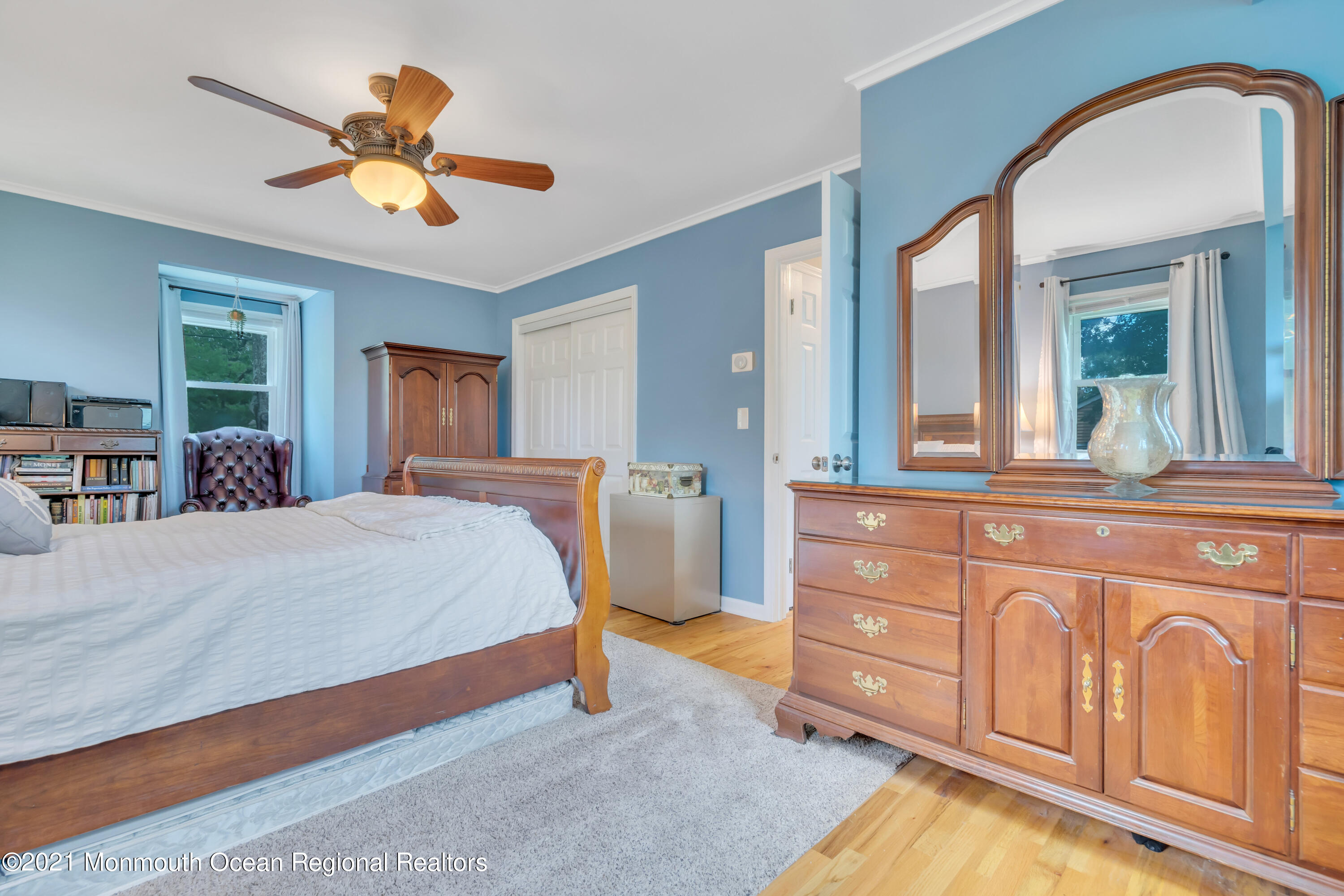 1675 Forge Pond Road Brick, NJ 08724 - Photo 28 of 69 a bedroom with a bed a dresser and a large window