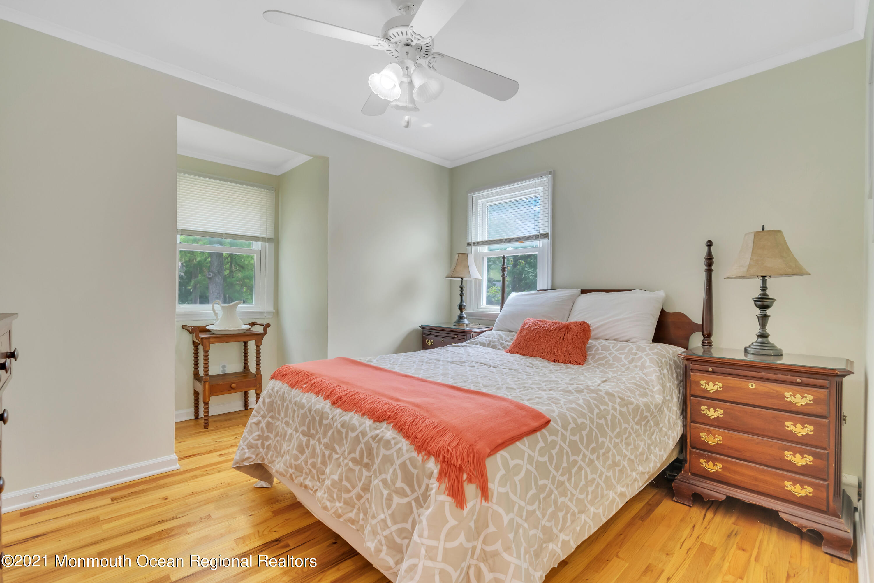 1675 Forge Pond Road Brick, NJ 08724 - Photo 32 of 69 a bedroom with a bed and a table with closet