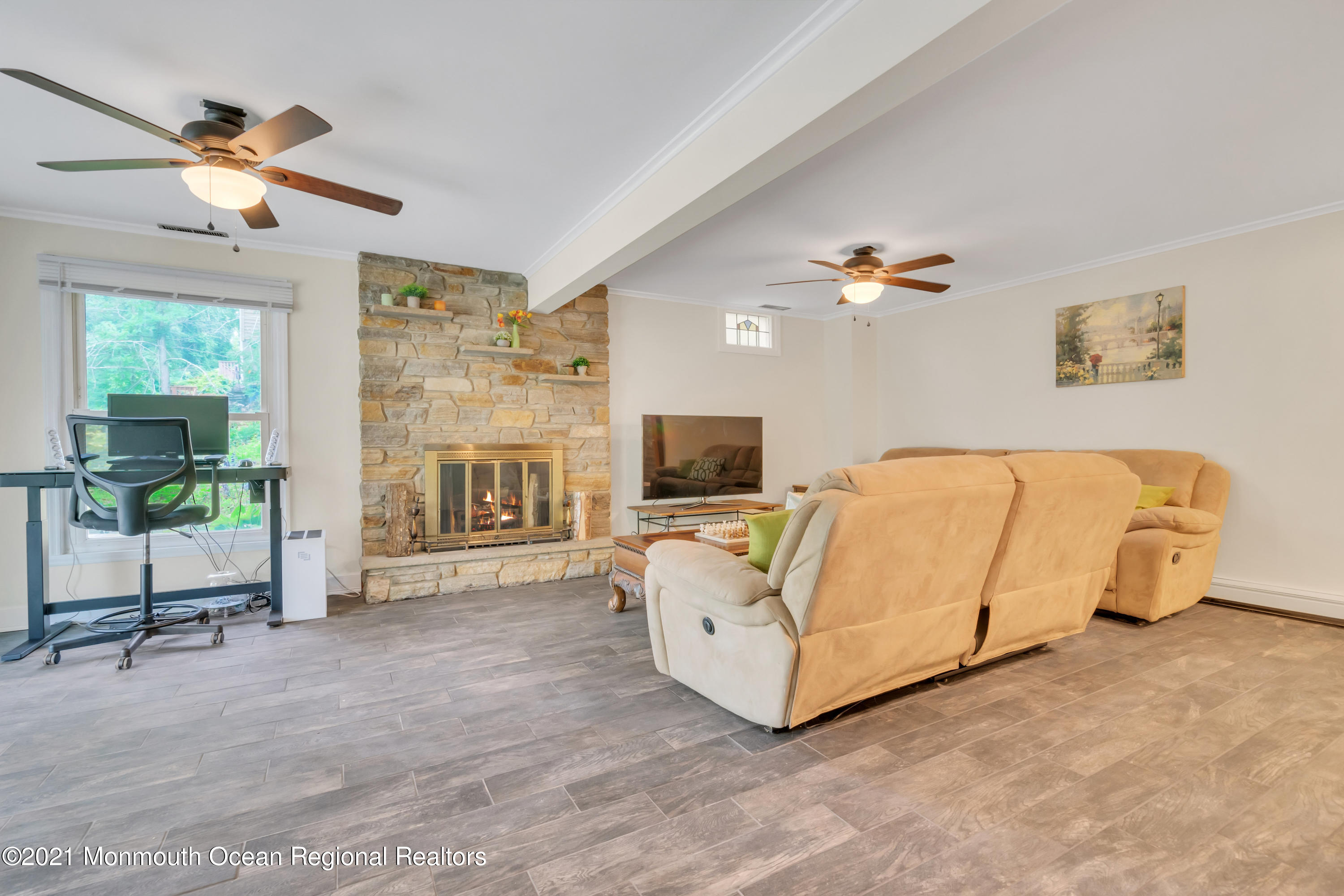 1675 Forge Pond Road Brick, NJ 08724 - Photo 37 of 69 a living room with furniture and a flat screen tv