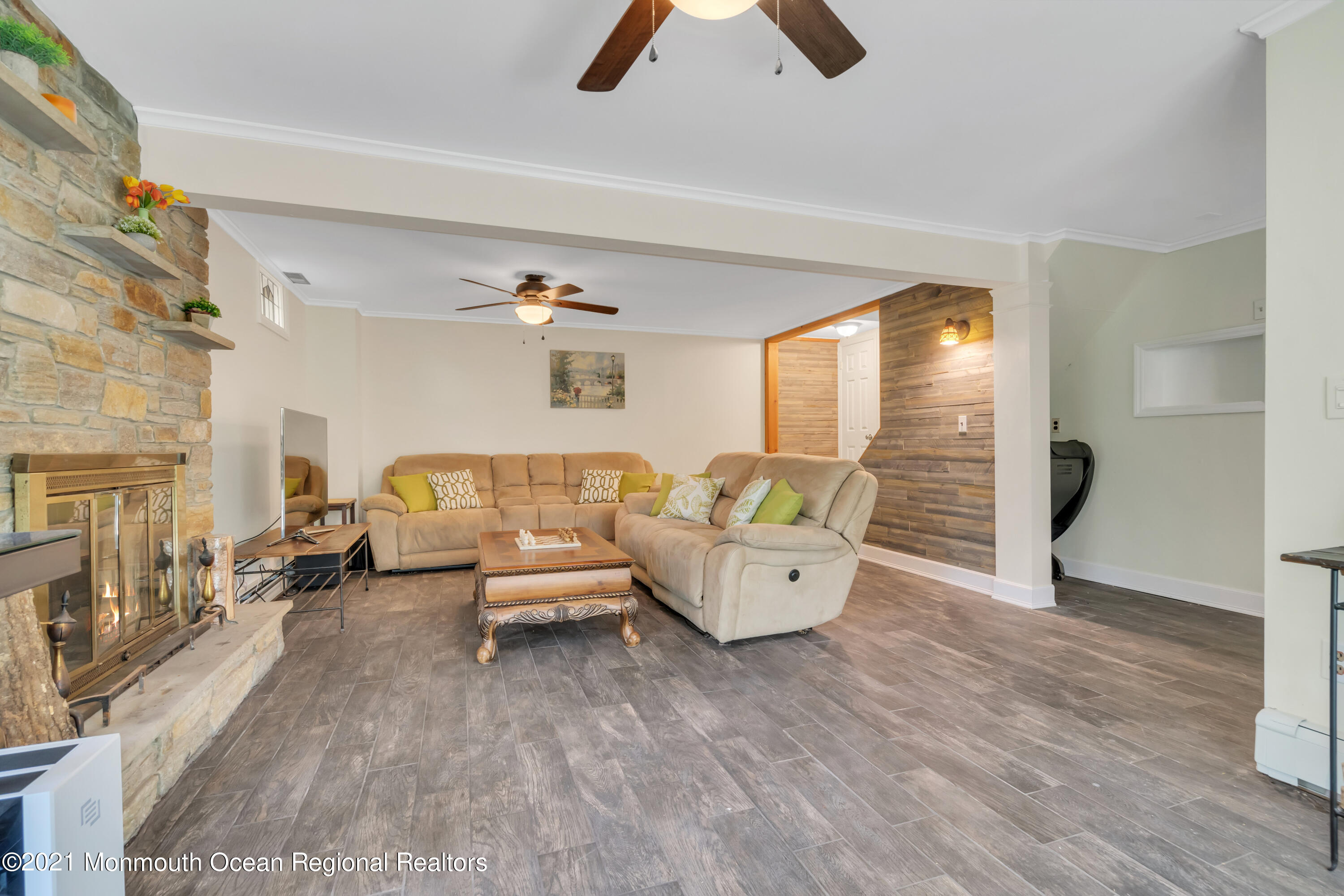 1675 Forge Pond Road Brick, NJ 08724 - Photo 39 of 69 a living room with furniture and a large window