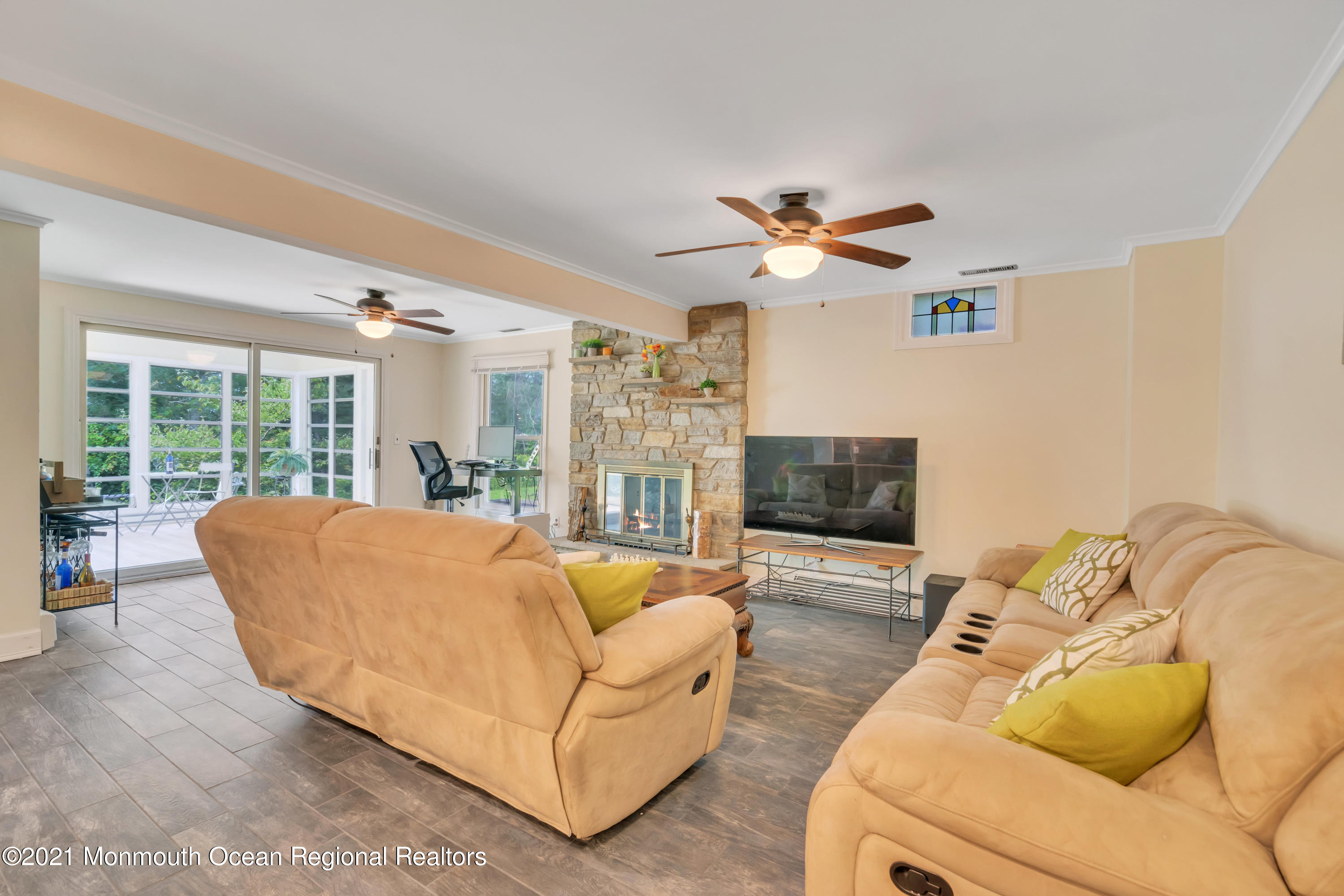 1675 Forge Pond Road Brick, NJ 08724 - Photo 40 of 69 a living room with furniture and a flat screen tv
