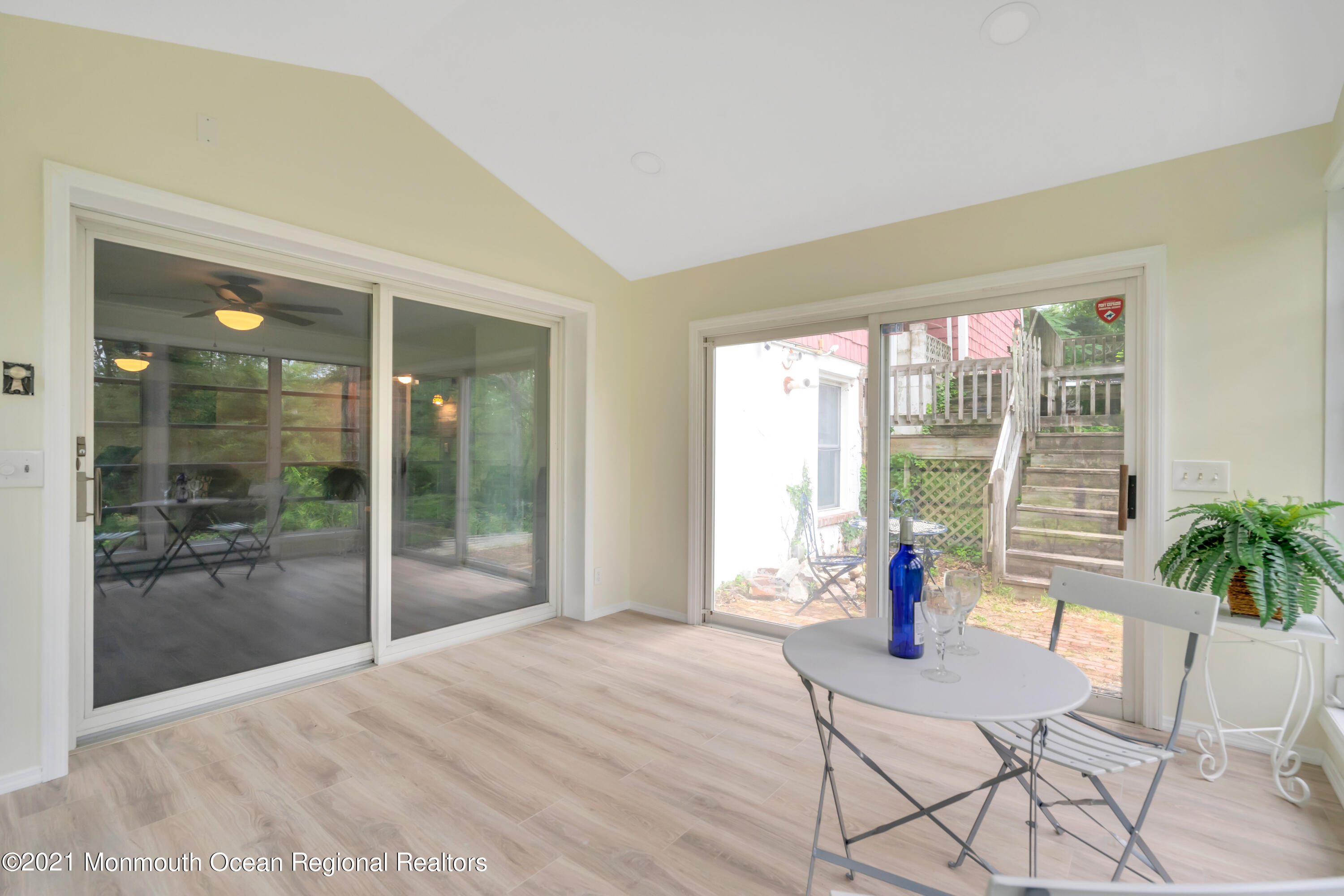 1675 Forge Pond Road Brick, NJ 08724 - Photo 42 of 69 a bedroom with a bed and glass door