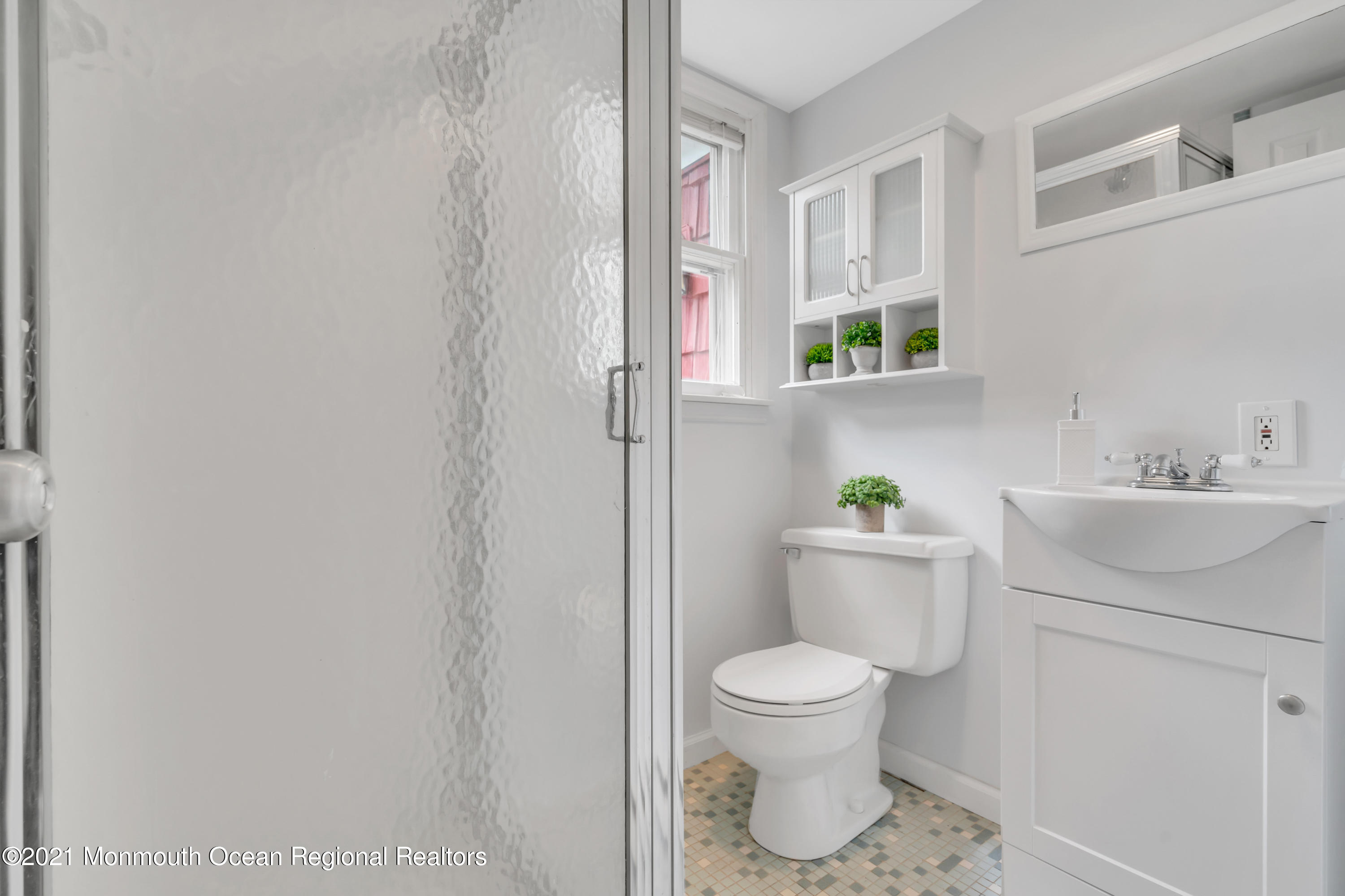 1675 Forge Pond Road Brick, NJ 08724 - Photo 44 of 69 a bathroom with a toilet sink and mirror