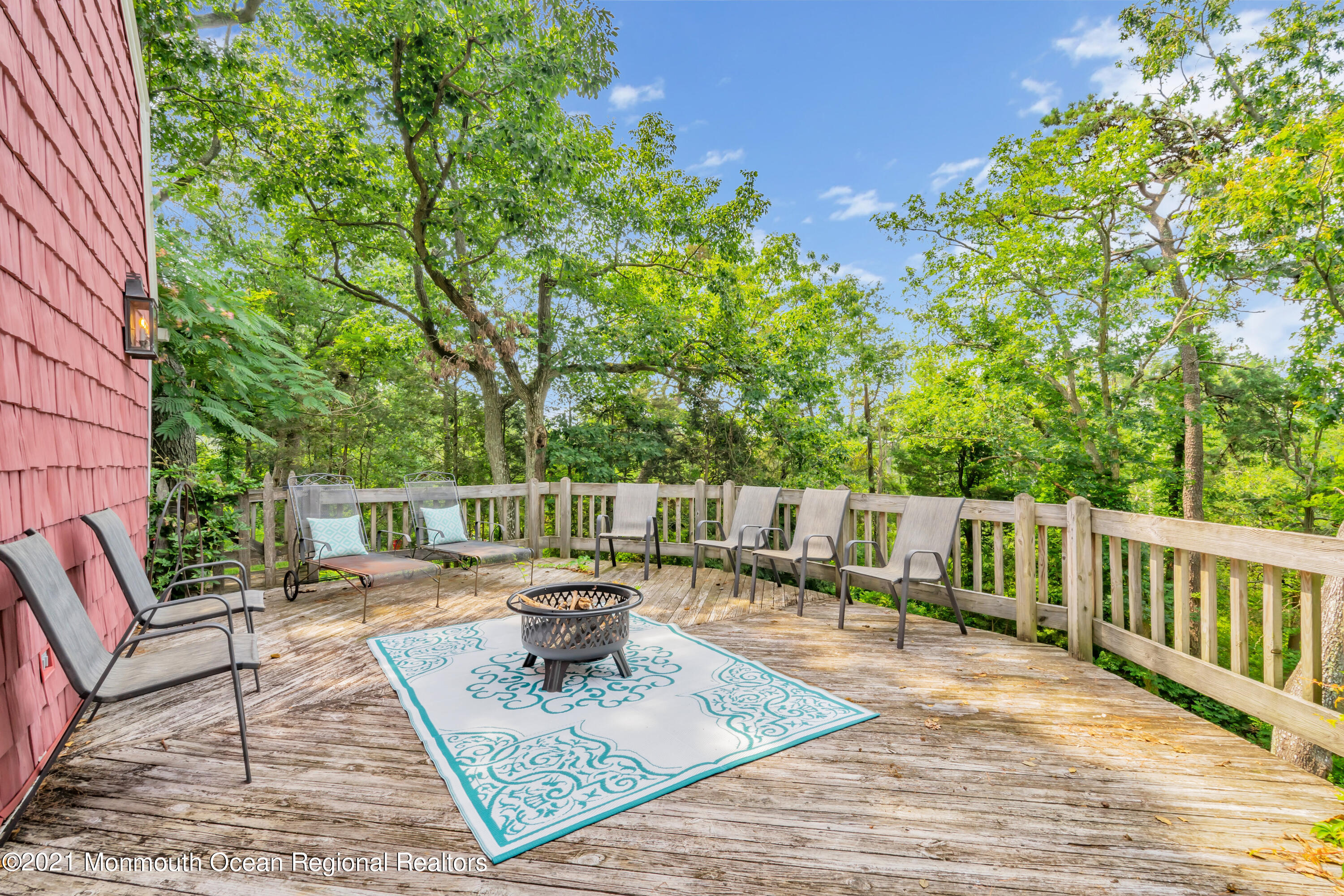 1675 Forge Pond Road Brick, NJ 08724 - Photo 52 of 69 a view of a deck with chairs a barbeque with wooden fence and floor