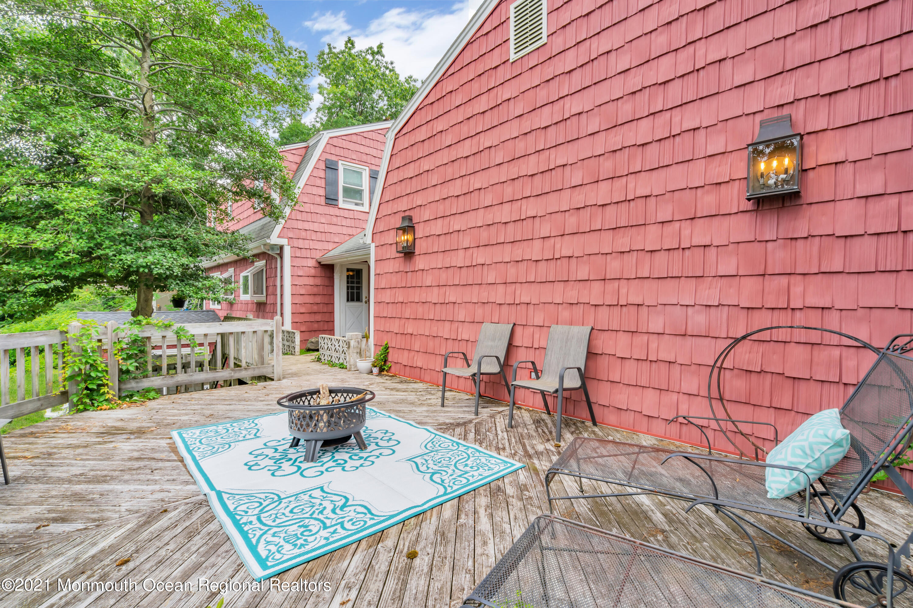 1675 Forge Pond Road Brick, NJ 08724 - Photo 53 of 69 a view of a patio with table and chairs and wooden floor