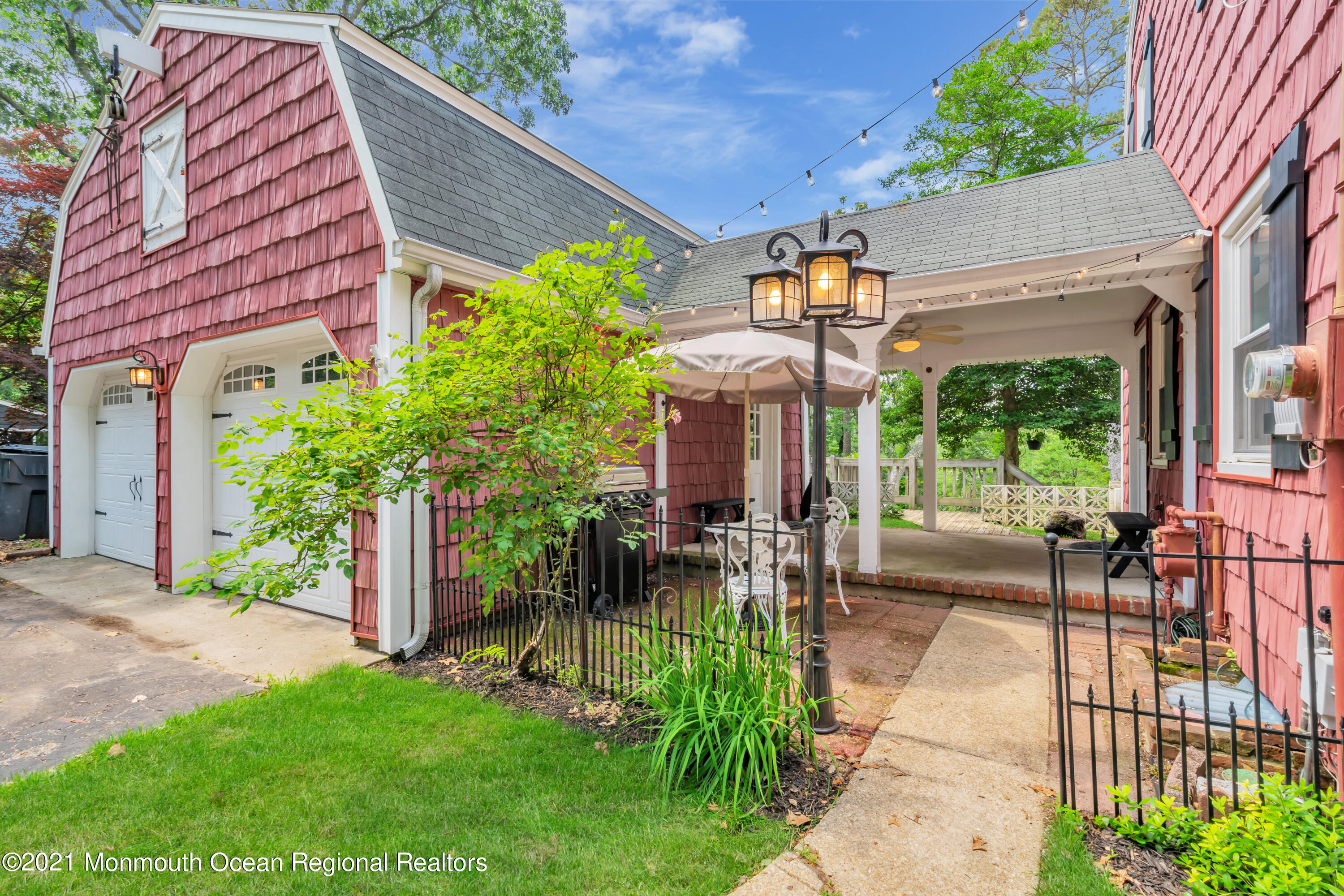1675 Forge Pond Road Brick, NJ 08724 - Photo 56 of 69 a view of a patio with table and chairs and potted plants