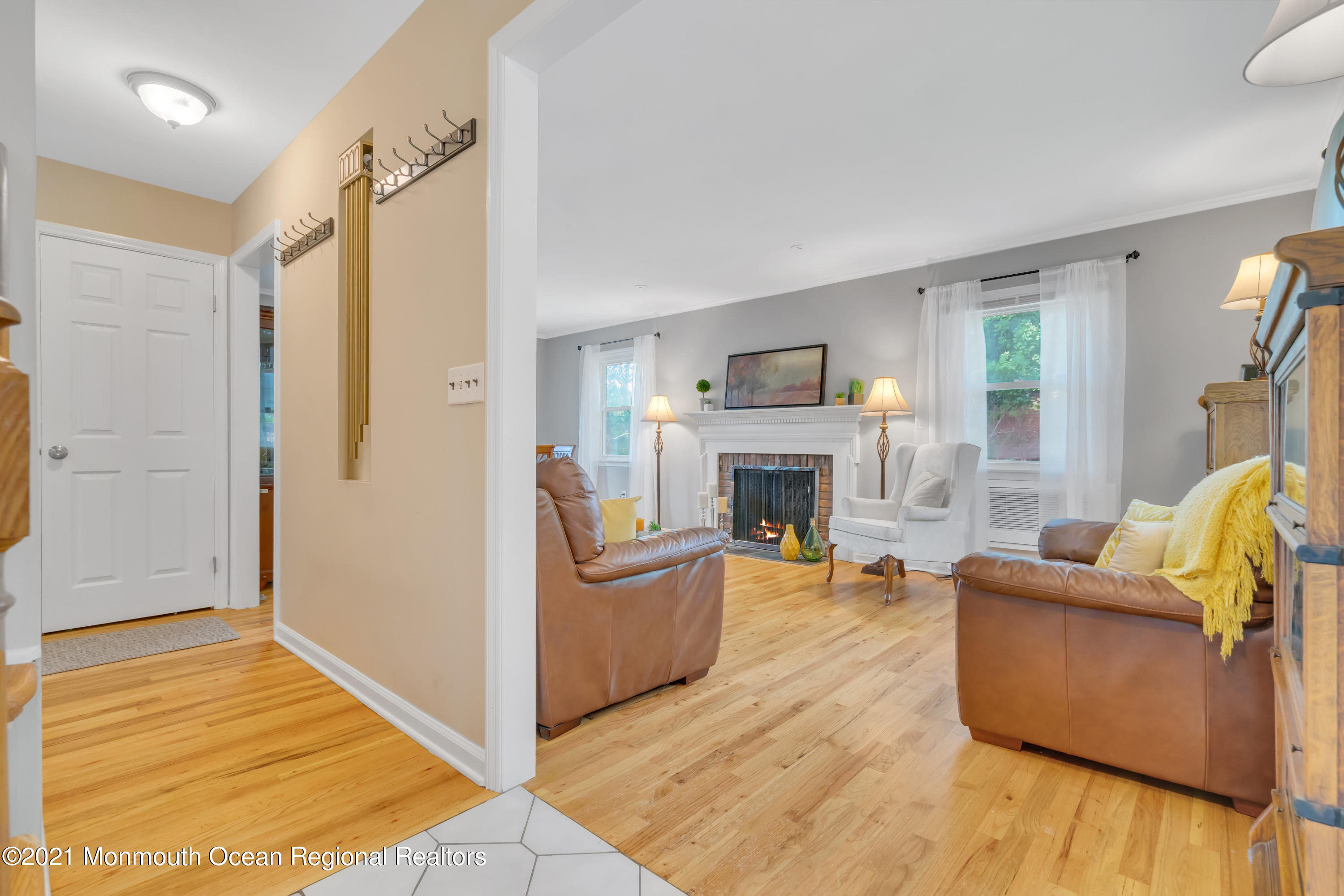 1675 Forge Pond Road Brick, NJ 08724 - Photo 7 of 69 a living room with furniture and a fireplace