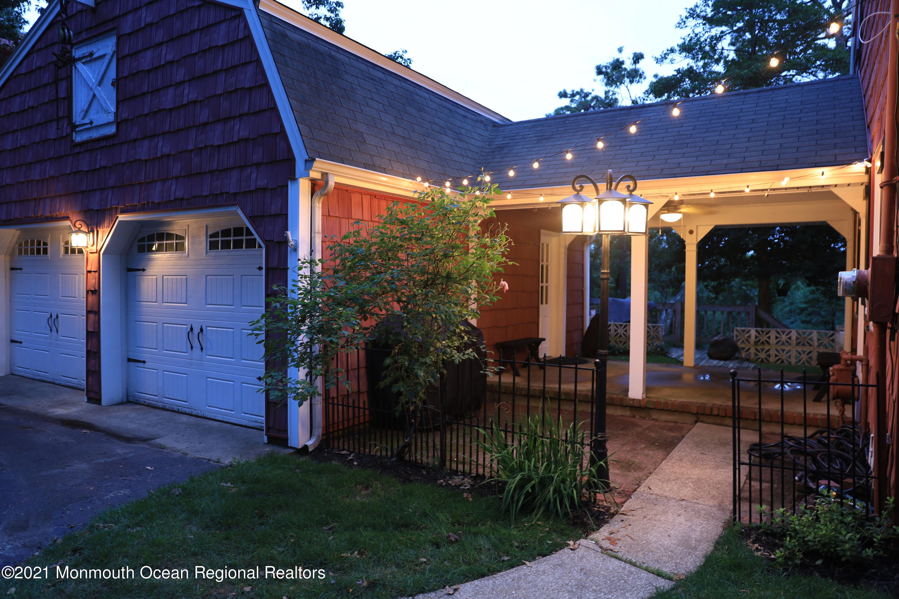 1675 Forge Pond Road Brick, NJ 08724 - Photo 61 of 69 a view of a porch with a table and chairs