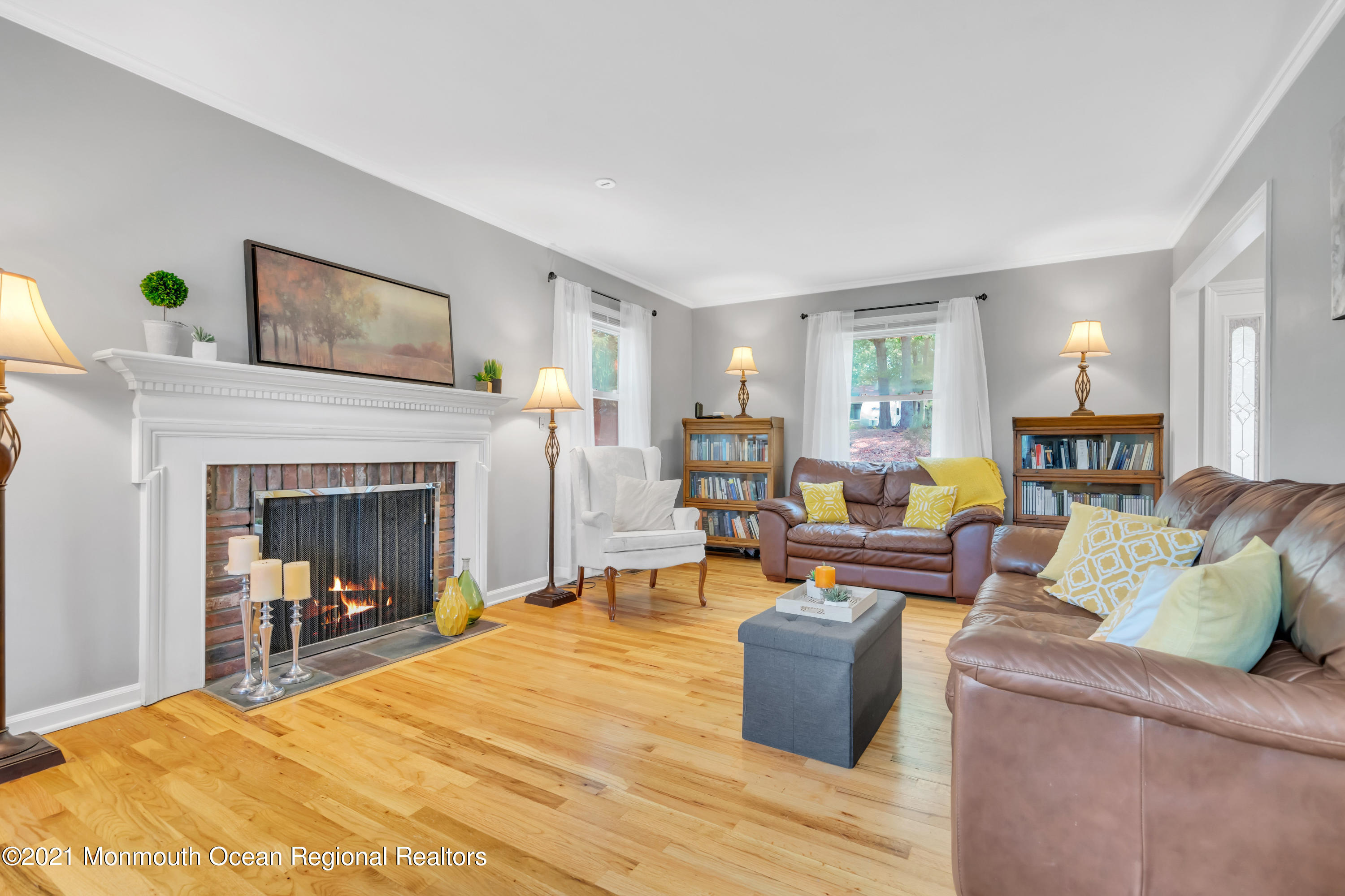 1675 Forge Pond Road Brick, NJ 08724 - Photo 10 of 69 a living room with furniture and a fireplace