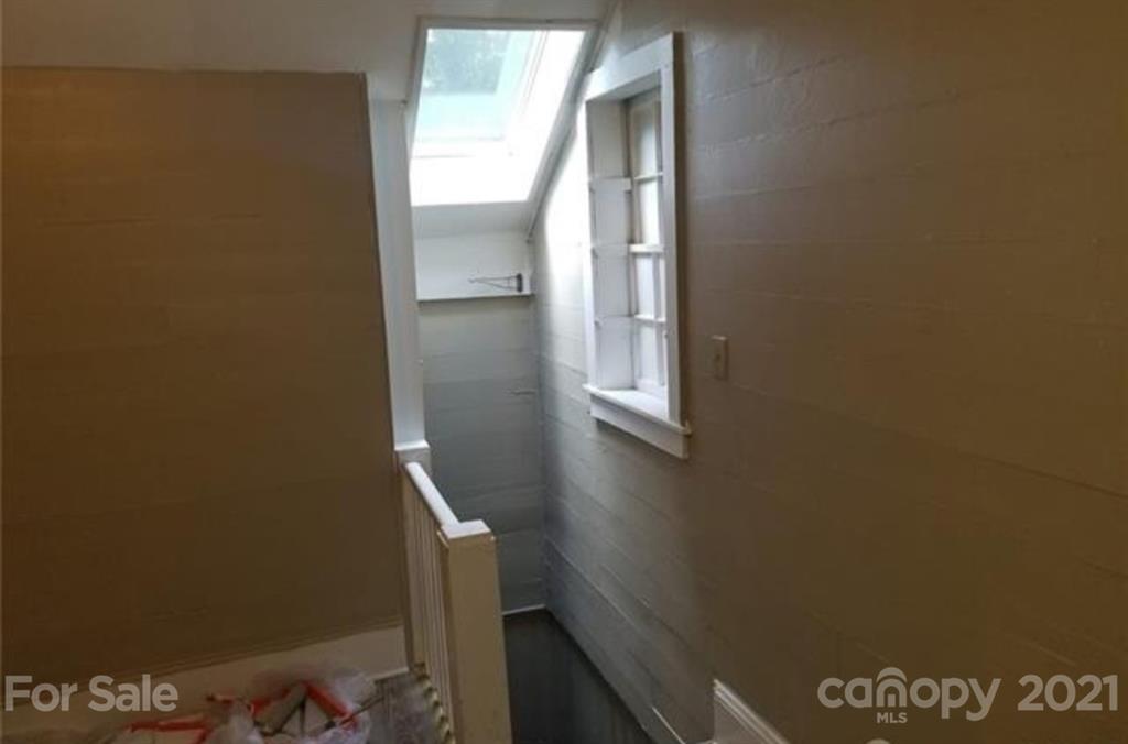 5226 Tuckaseegee Road Charlotte, NC 28208 - Photo 14 of 18 a view of stairs
