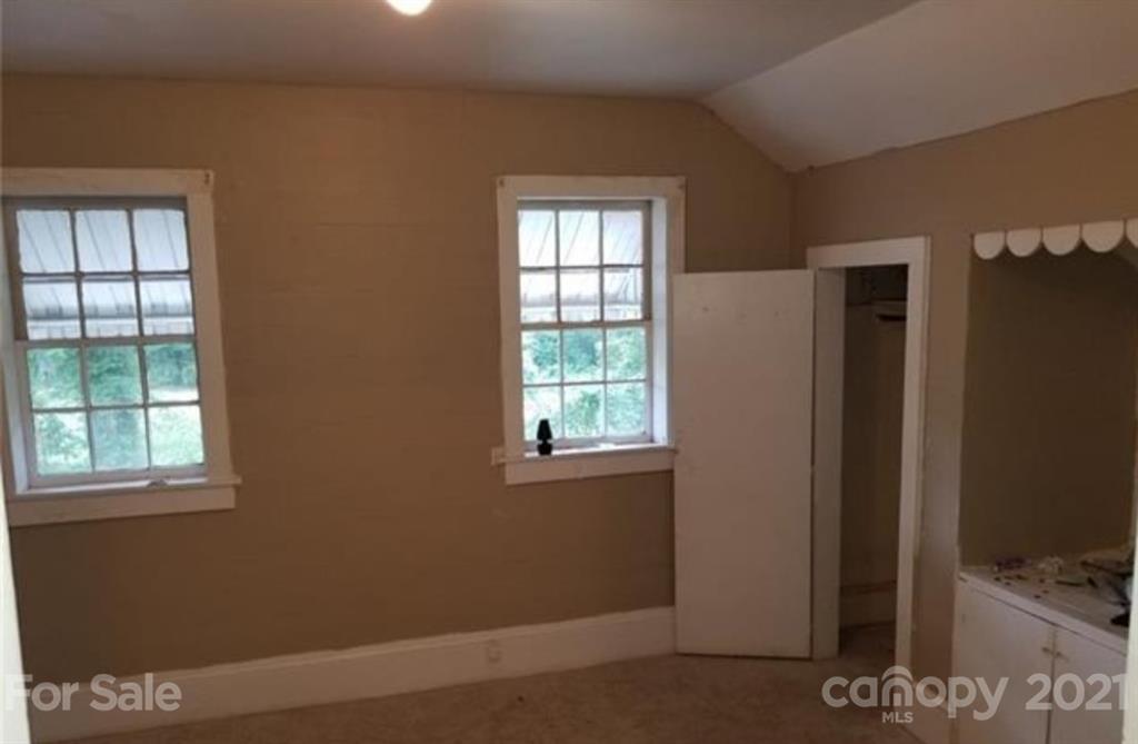 5226 Tuckaseegee Road Charlotte, NC 28208 - Photo 15 of 18 a view of an empty room with a window