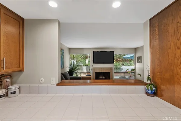a kitchen with stainless steel appliances a sink stove and cabinets