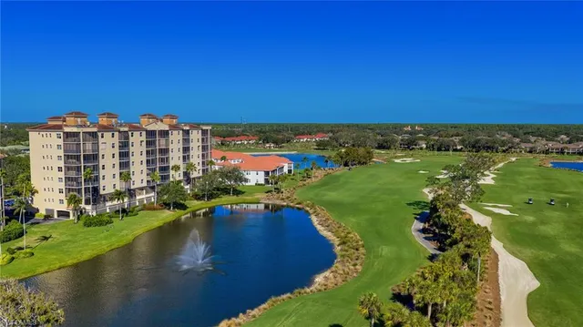 a view of a lake with a yard
