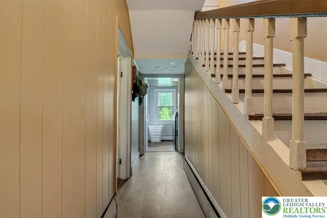a kitchen with stainless steel appliances a sink stove and refrigerator