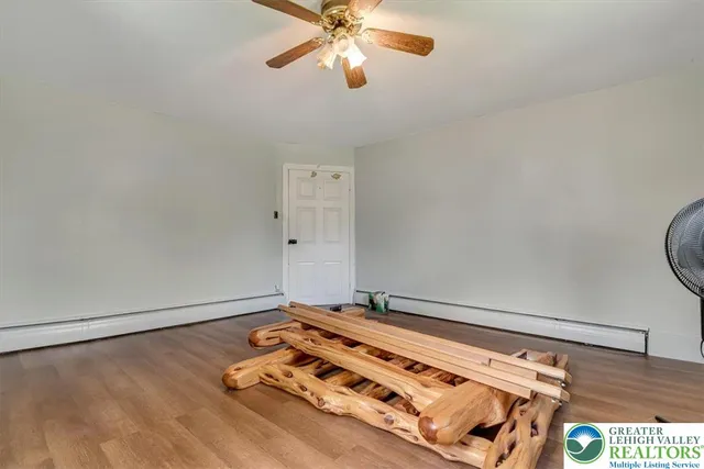 a view of a big yard with a swimming pool