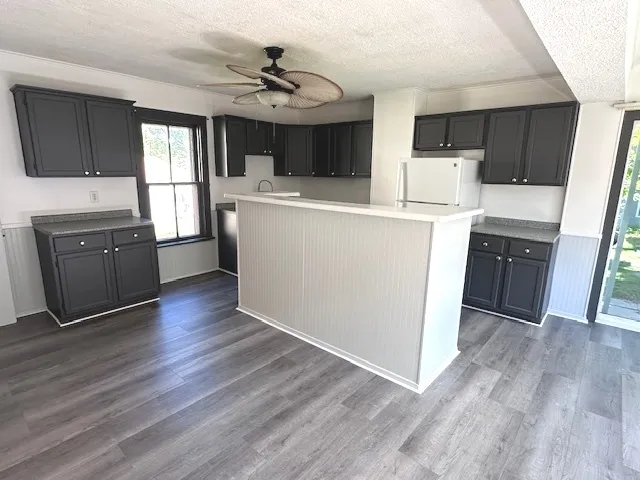 a view of a dining room with furniture wooden floor and a carpet