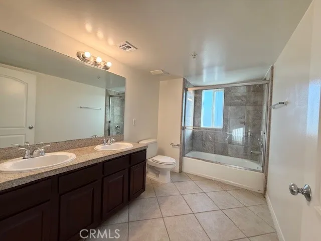a view of a kitchen with wooden floor