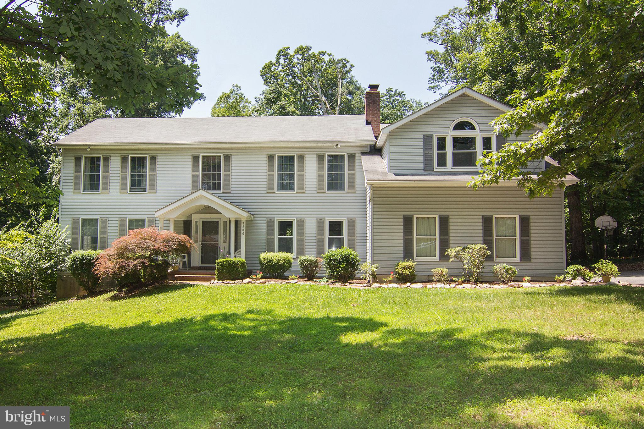 Colonial on a 4.54 acre corner lot
