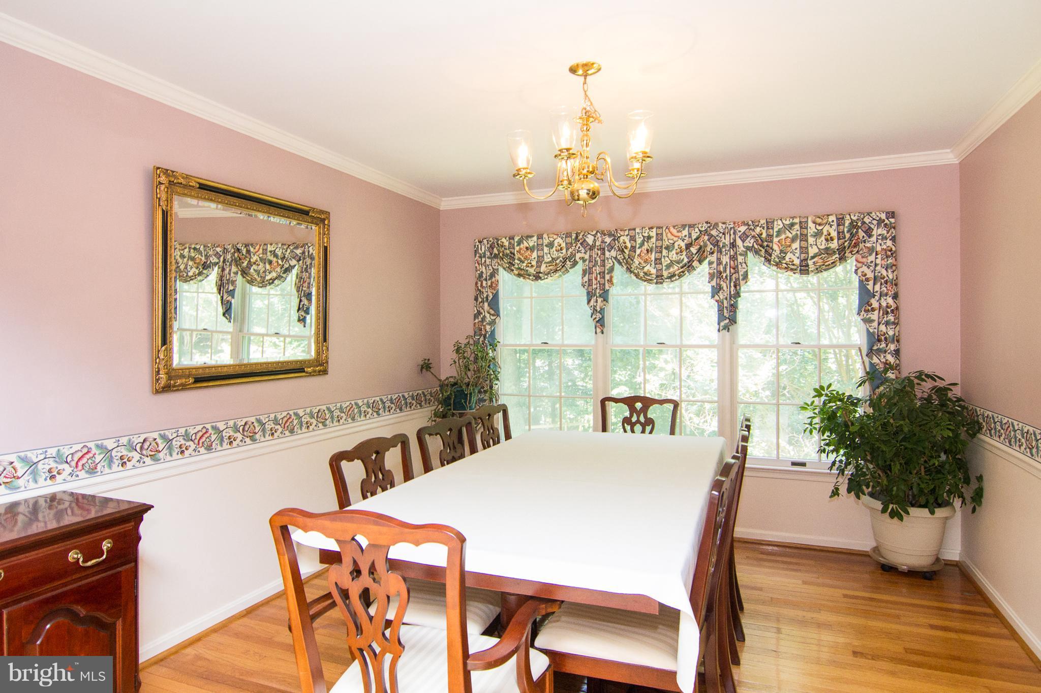 3480 Hooper Road New Windsor, MD 21776 - Photo 8 of 30 Dining Room has chair rail & crown molding