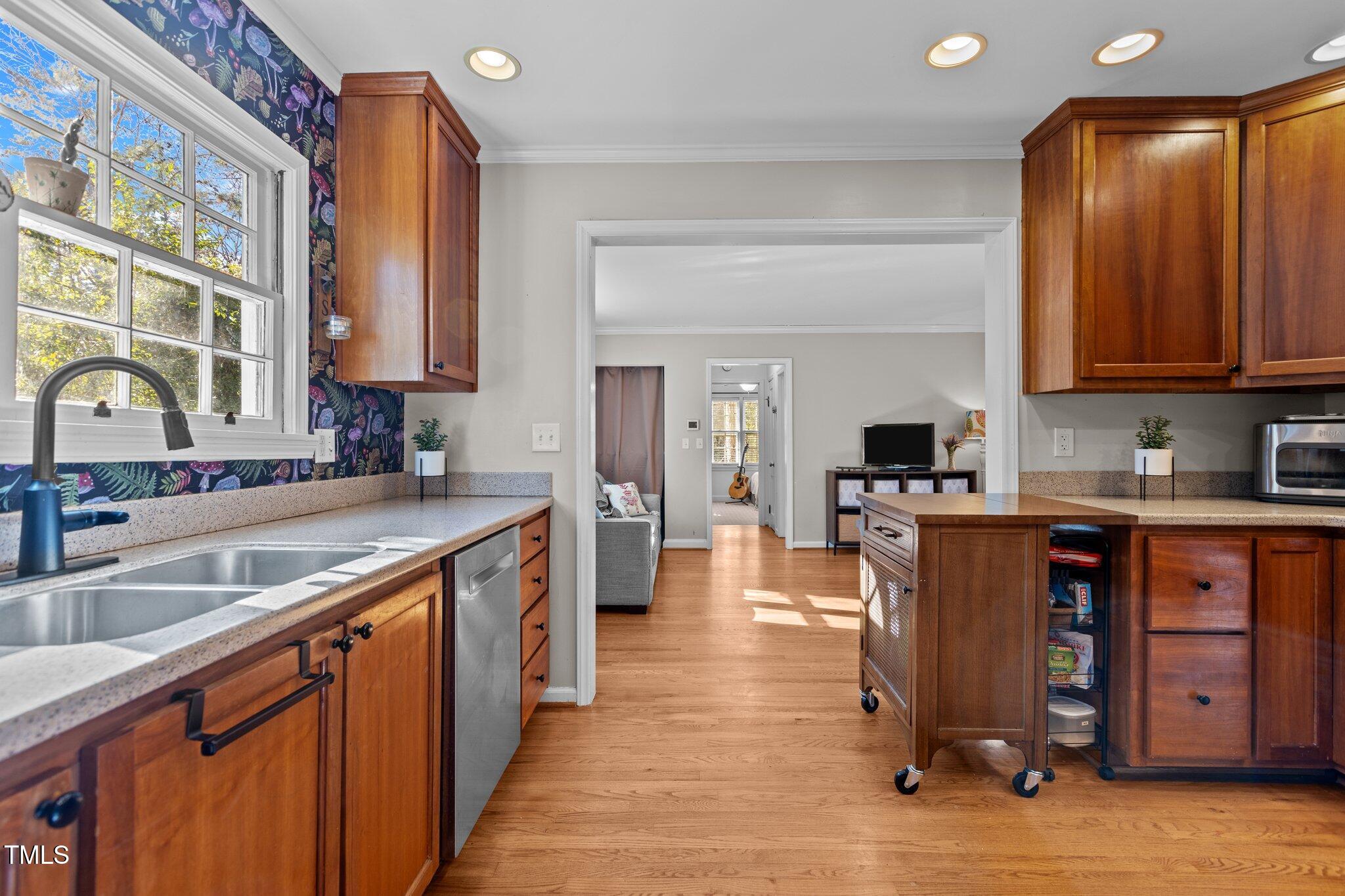 1325 Duplin Road Raleigh, NC 27607 - Photo 7 of 46 Kitchen sits in-between the Dining Room and the back Den.