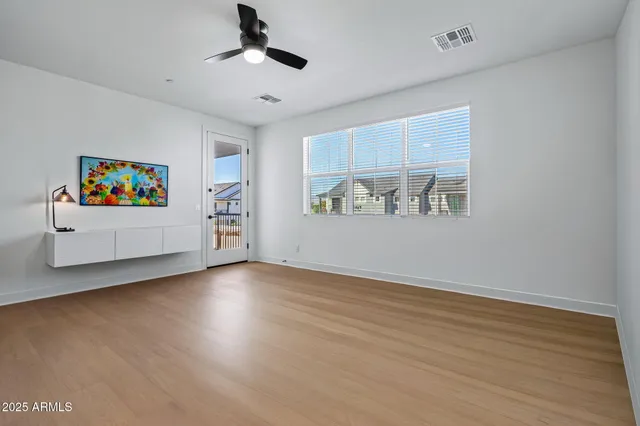 a bathroom with a double vanity sink mirror and shower