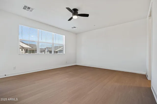a bathroom with a shower and a mirror