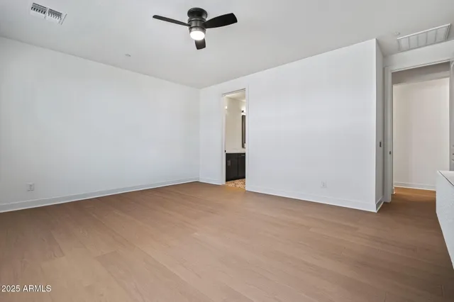 a bathroom with a double vanity sink mirror and