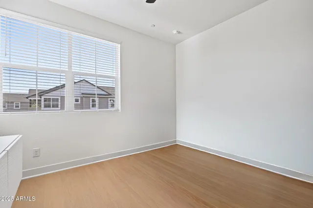 a aerial view of a house with a yard