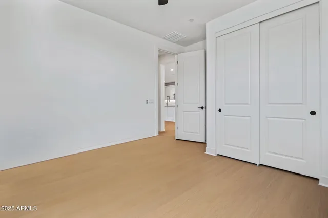 a view of a city that has lawn chairs