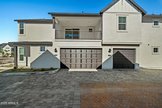 a view of a livingroom with wooden floor and a window