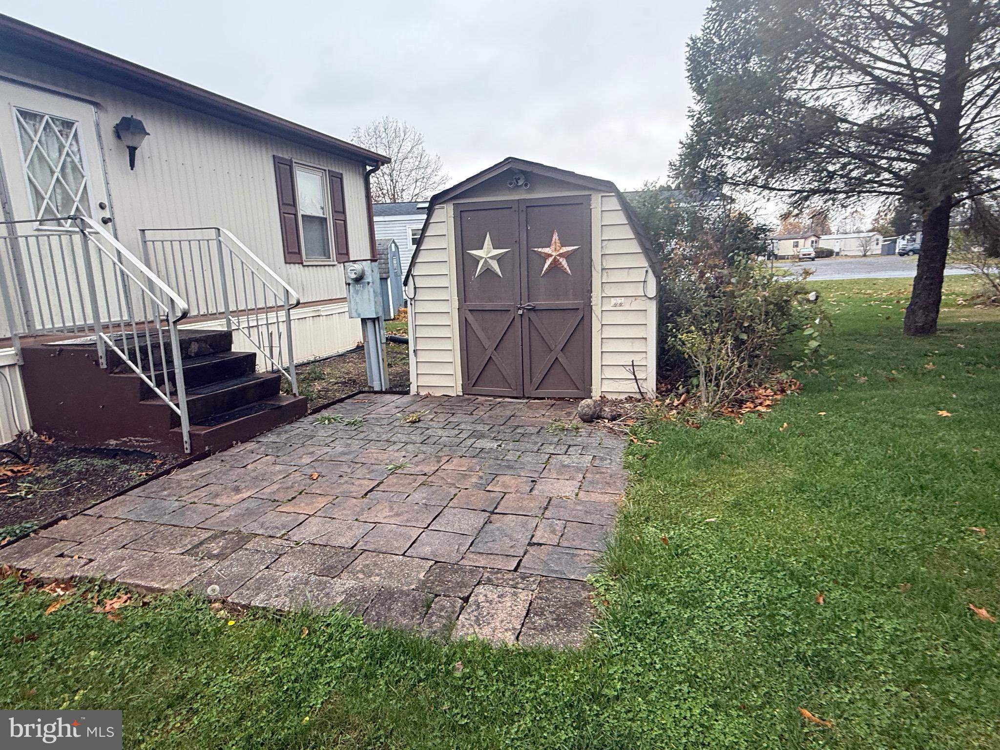 800 York Road Dover, PA 17315 - Photo 3 of 12 a front view of a house with garden