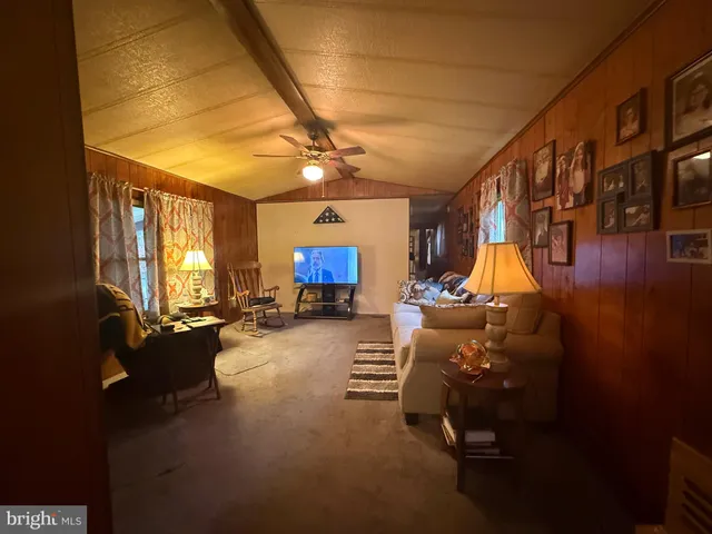 a bed room with furniture and a window