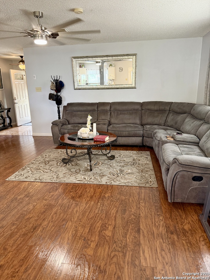 6719 Raintree Path San Antonio, TX 78233 - Photo 5 of 24 a living room with a couch