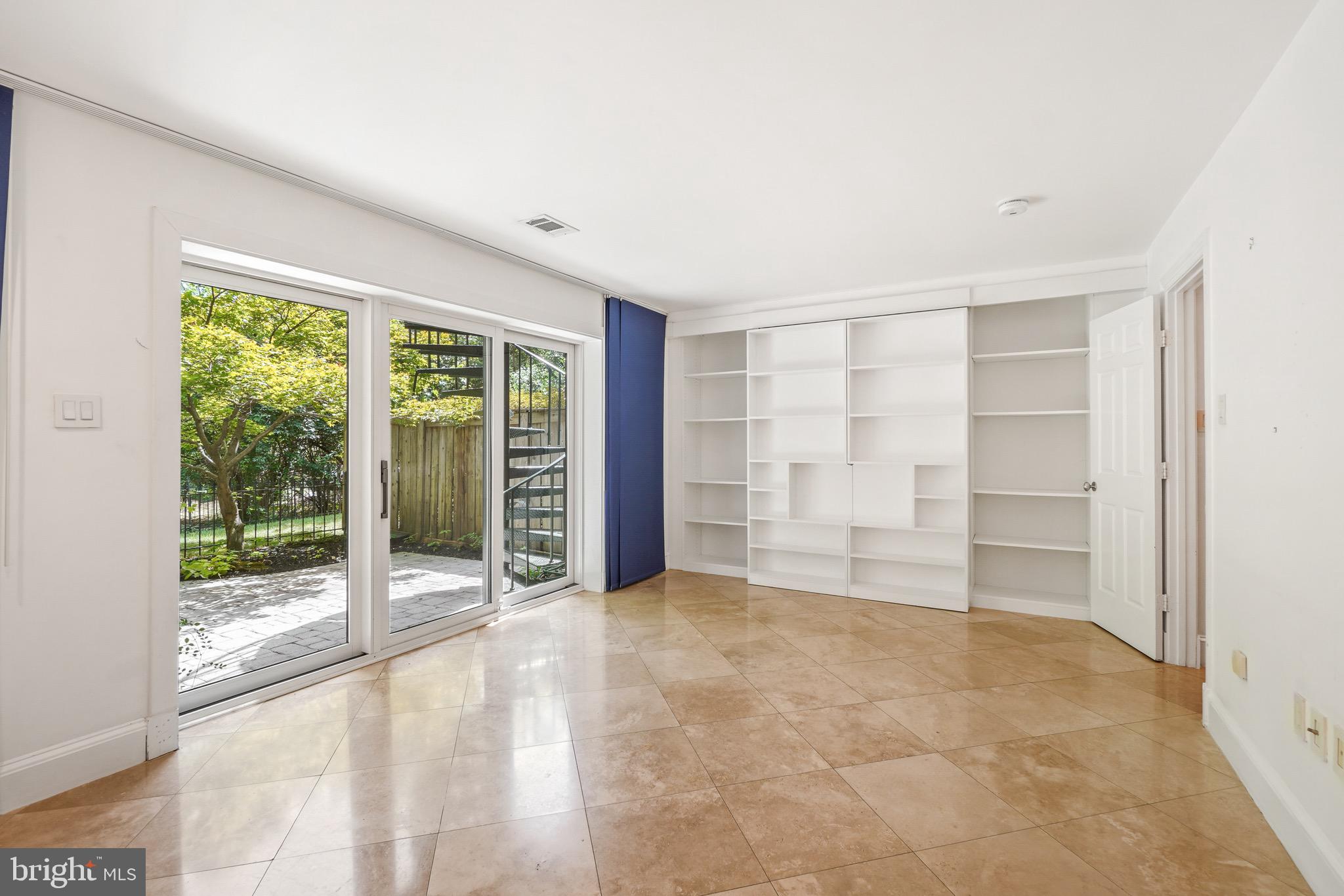 3927 Georgetown Court Northwest Washington, DC 20007 - Photo 29 of 36 Lower level family/recreation room with Murphy bed