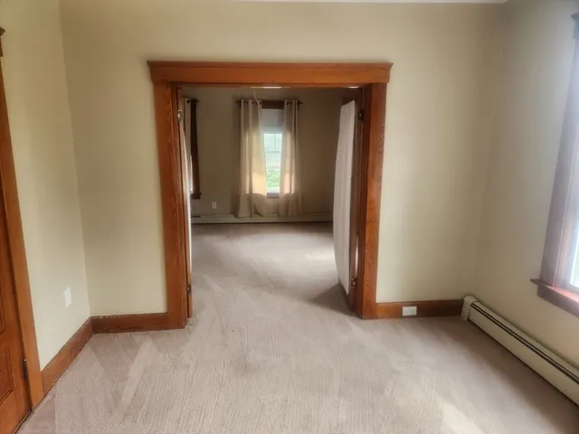 a view of a room with a hallway