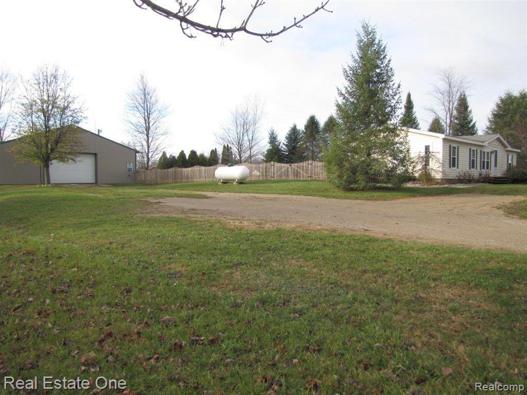 743 Chase Lake Road Howell, MI 48855 - Photo 2 of 16 Side View