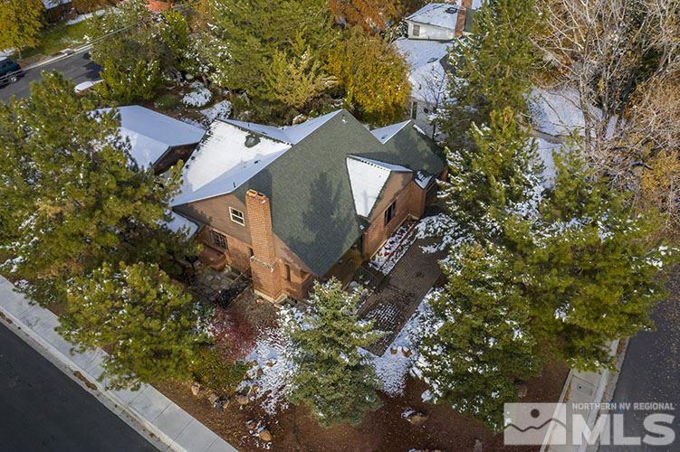 844 Whitaker Drive Reno, NV 89503 - Photo 13 of 34 an aerial view of a house with a yard and trees